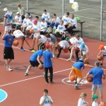 The Kazickas youth help Neal Meyer conduct the clinic