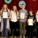 School's students who took the Lithuanian Language Proficiency Test with their diplomas