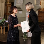 KFF Vilnius office director Agne Vertelkaite presents dr. Rita Miliunaite with the Award